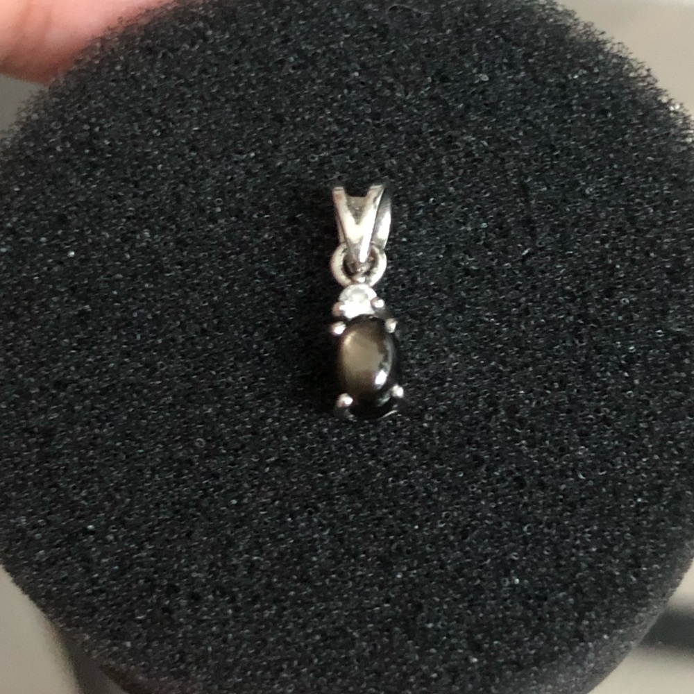 Black/brown gemstone silver pendant